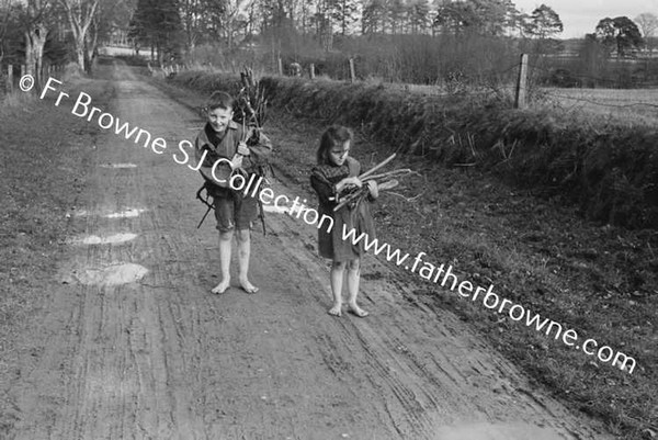 TOMMY & ELIZABETH MCEVOY AS BEGGARS FOR FOXFORD FILM